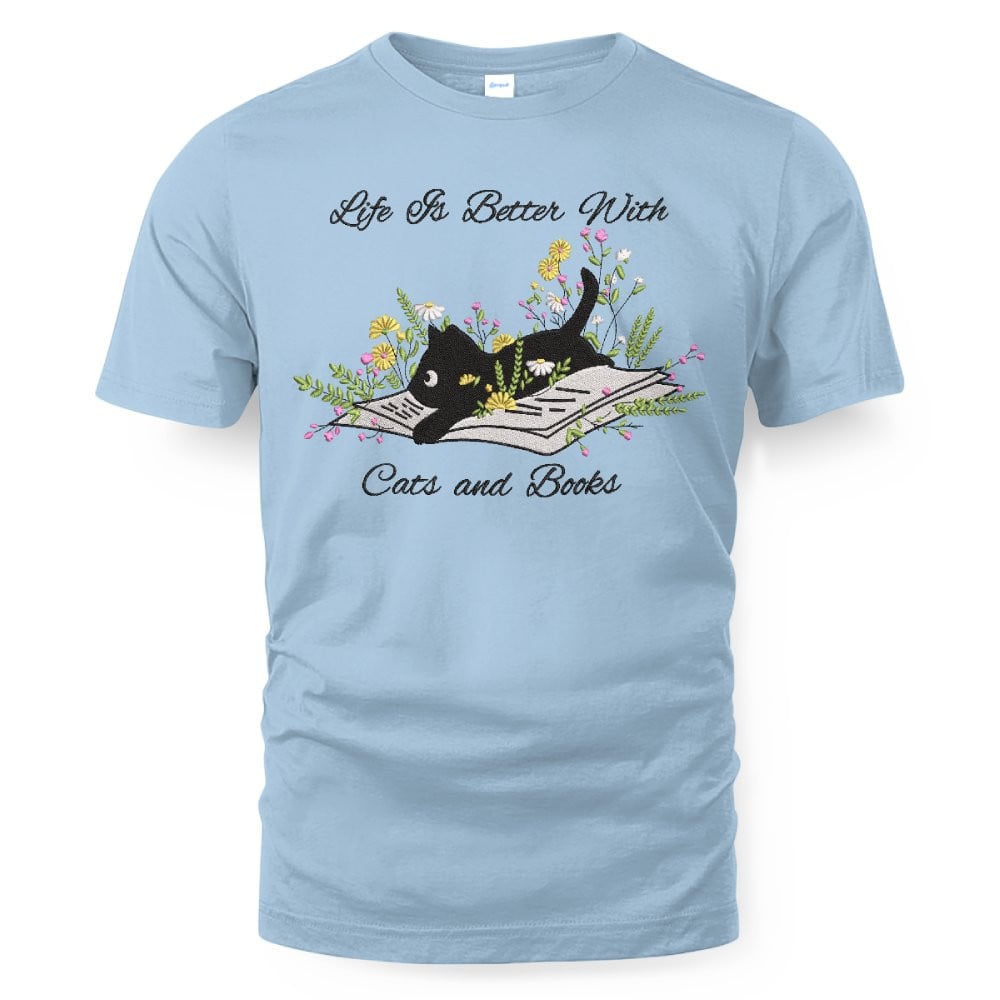 Cute Cat Lying On Book With Flower Embroidered Shirt For Book Lovers